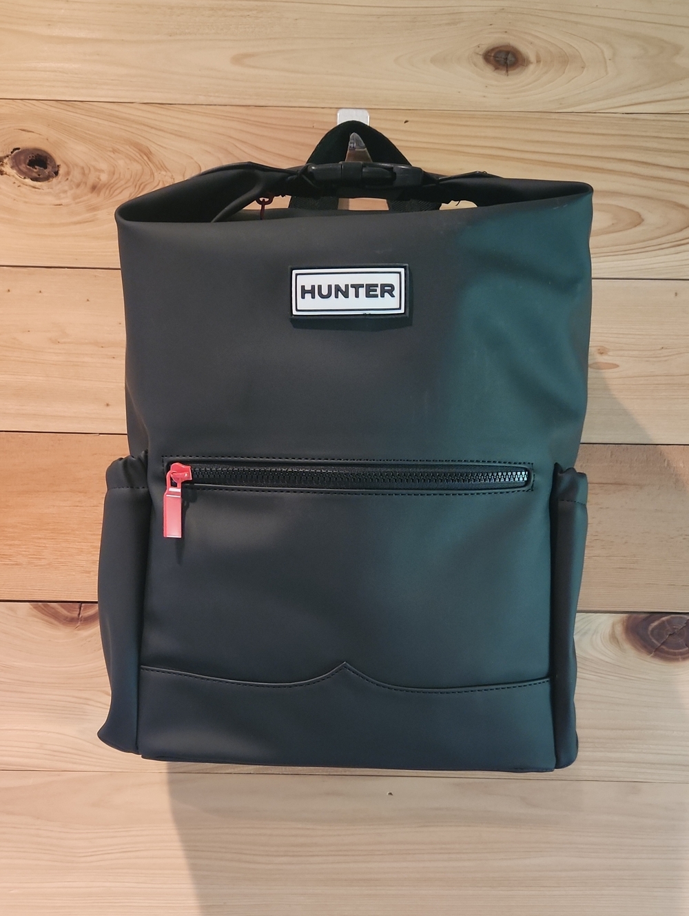Hunter Black Roll-Top Backpack with Red Zipper Pull
